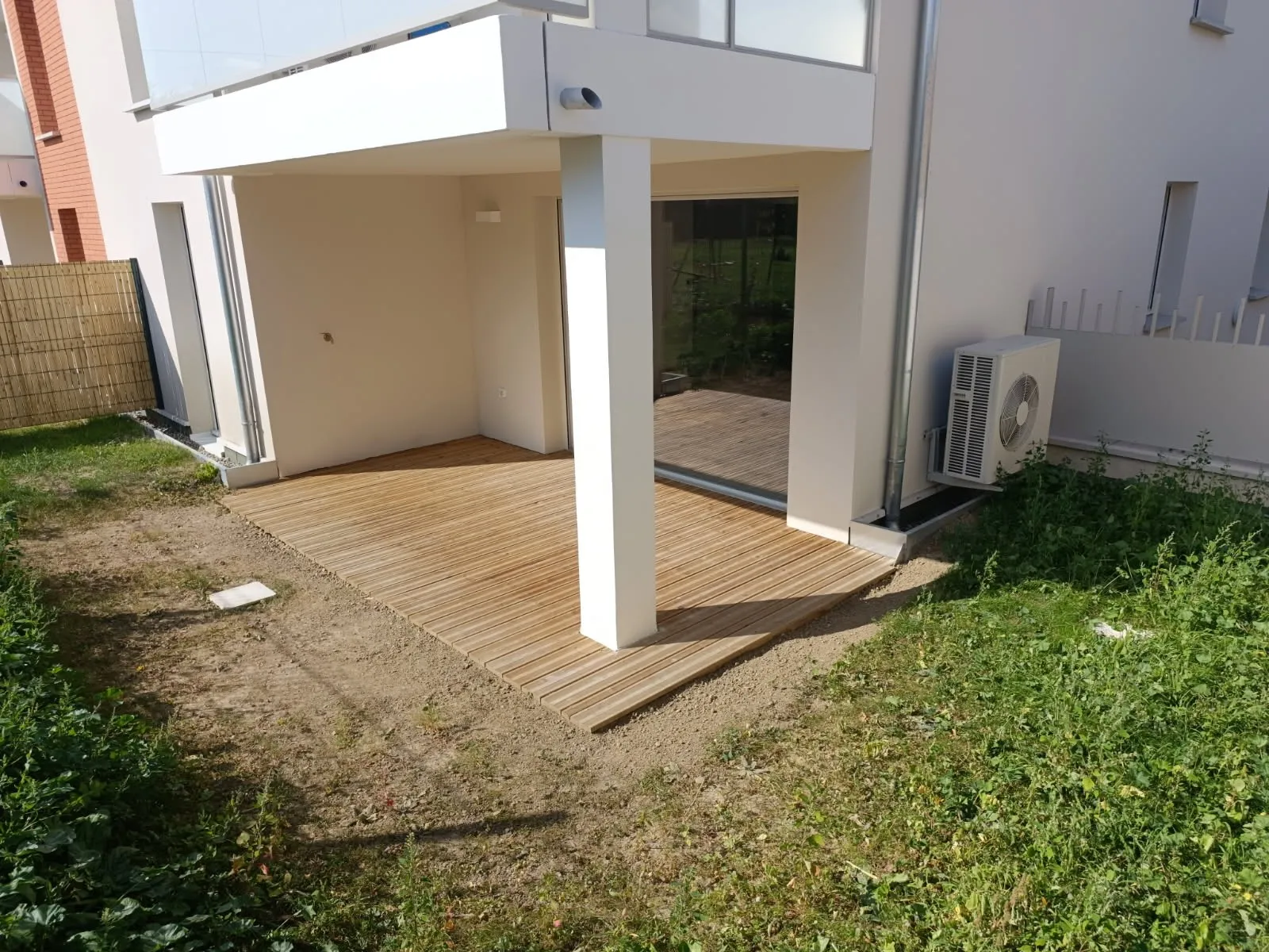 Appartement RDC 70m² avec petit jardin, chambre de 12m² disponible. — image 3 sur 14